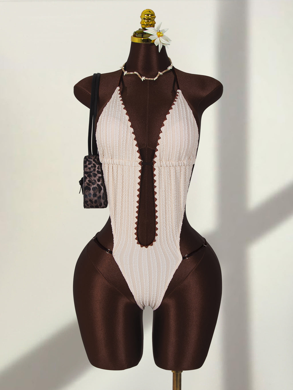 White ribbed knit halter-neck onesie swimsuit