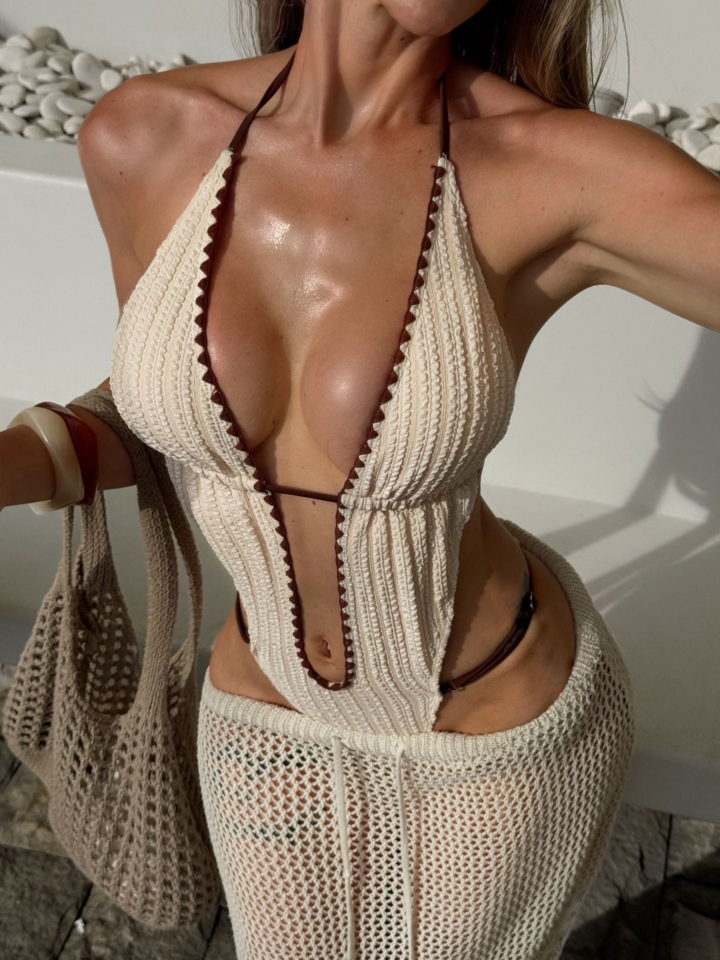 White ribbed knit halter-neck onesie swimsuit